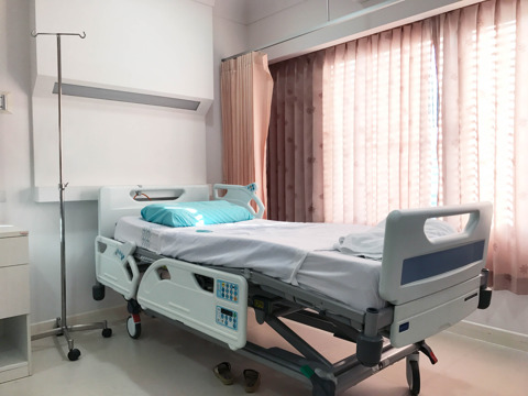 Empty Hospital Bed For Patient
