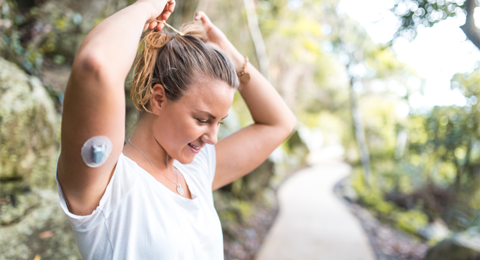 Woman With Dexcom CGM On Arm R