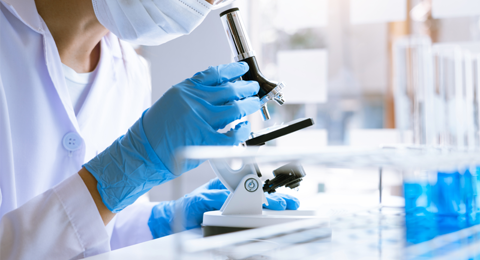 Medical Researcher Microscope R