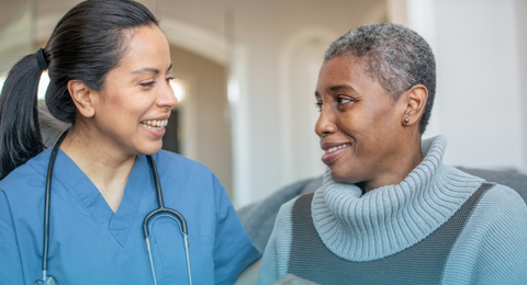 Young Doctor With Elderly Doctor Banner